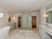 Frameless Double Door Shower with Slipper Tub and Carrara Marble Floors and Countertops